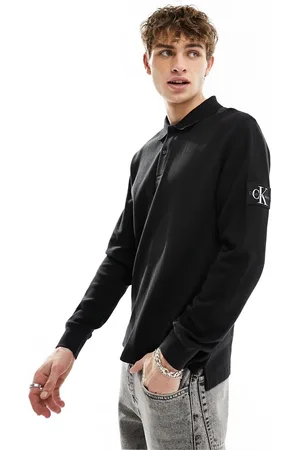 Calvin Klein Polo a maniche lunghe nera in tessuto a nido d