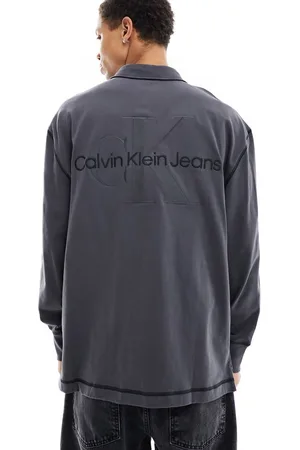Calvin Klein Polo stile rugby a maniche lunghe nera con monogramma del logo