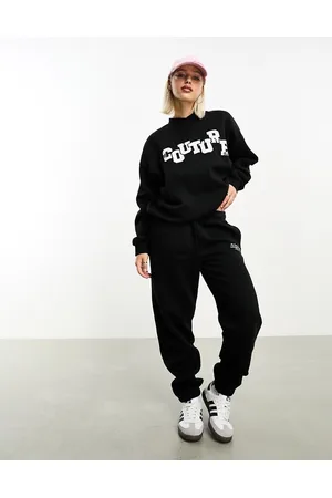 The Couture Club Joggers neri con applicazione