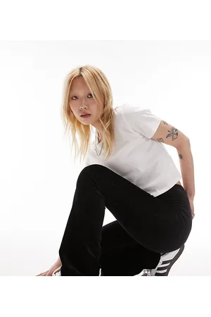 Topshop Pantaloni a zampa elasticizzati in velluto a coste neri