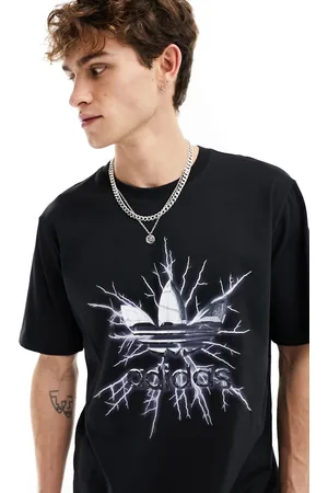 adidas T-shirt nera e argento con grafica di elettricità