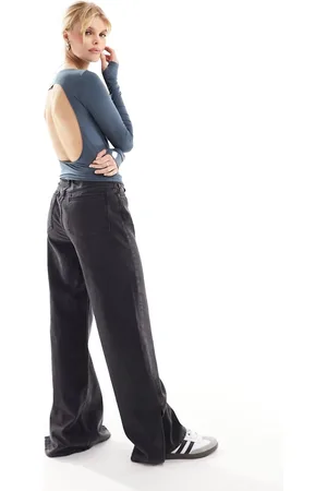 Weekday Top a maniche lunghe blu scuro senza cuciture con schiena scoperta