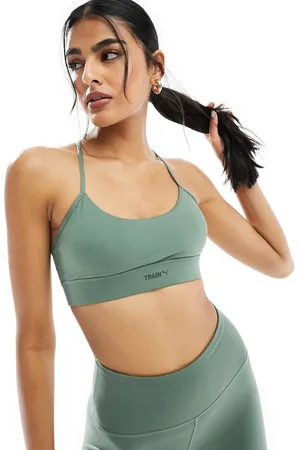 PUMA Training Evolve - Reggiseno sportivo a sostegno leggero chiaro