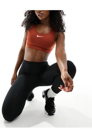 Nike Reggiseno a sostegno medio in tessuto Dri-Fit color grezzo con logo Nike