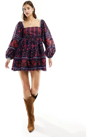 Free People Vestito grembiule corto stile babydoll con stampa a fiori