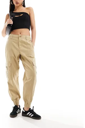 River Island Pantaloni cargo beige con polsino