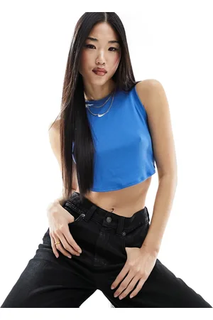 Nike Essential - Crop top senza maniche stellare a coste