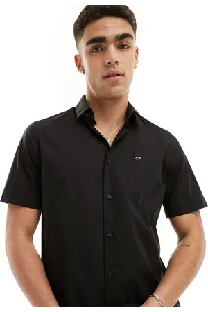 Calvin Klein Camicia vestibilità classica a maniche corte nera elasticizzata in popeline
