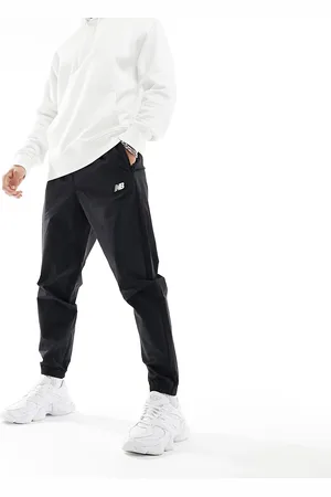 New Balance Athletics - Joggers neri in tessuto stretch
