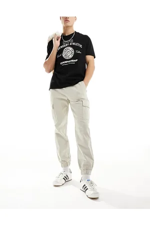 Bershka Pantaloni cargo color sabbia con fondo elasticizzato