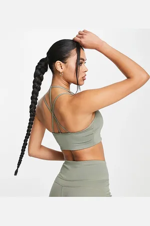 PUMA Studio Granola - Reggiseno sportivo a sostegno leggero con spalline sottili color kaki tenue