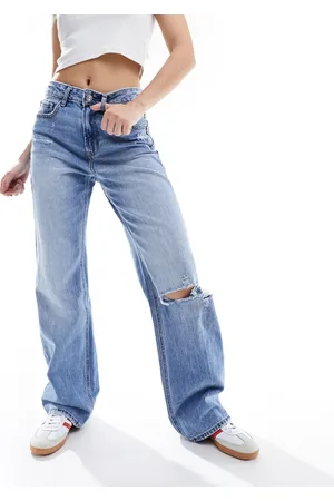 Stradivarius Jeans dad a fondo ampio lavaggio medio con strappi
