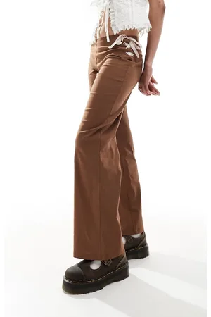 Reclaimed Pantaloni a zampa marroni con fiocchi rosa e nastri
