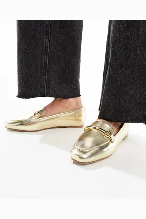 London Rebel Mocassini color champagne con finiture con morsetto