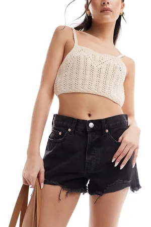 MANGO Pantaloncini di jeans con fondo grezzo neri
