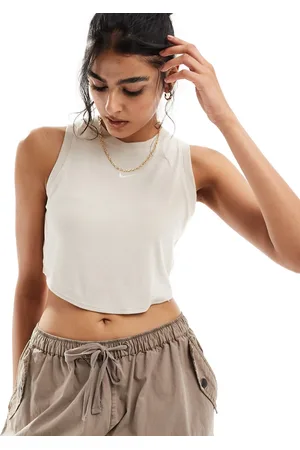 Nike Essential - Crop top senza maniche beige a coste