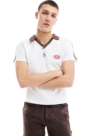 Reclaimed Polo unisex vestibilità ristretta con dettagli a righe