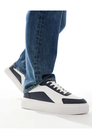 ASOS Sneakers bianche con suola spessa e dettagli blu