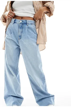 Stradivarius Petite - Jeans a fondo ampio lavaggio chiaro