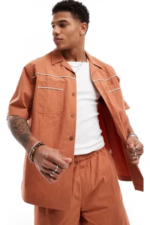 ASOS Camicia oversize squadrata a maniche corte color ruggine con profili a contrasto in coordinato