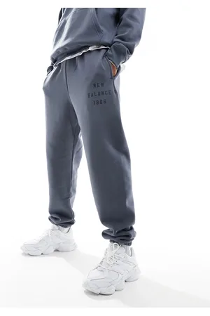 New Balance Iconic - Joggers antracite in pile stile college