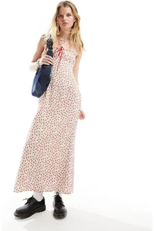 Kiss The Sky Vestito lungo con spalline sottili color crema e rosso a fiorellini con fiocco