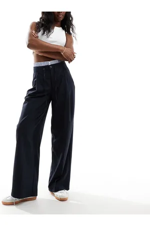 Bershka Pantaloni sartoriali scuro gessato con fascia in vita stile boxer