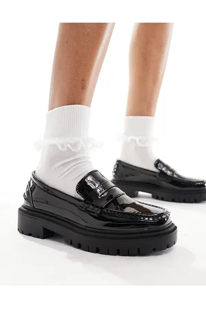Schuh Lexis - Mocassini neri di vernice con suola spessa