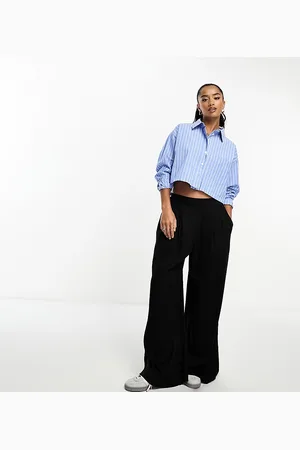 ASOS ASOS DESIGN Petite - Pantaloni neri a fondo ampio piatti sul davanti