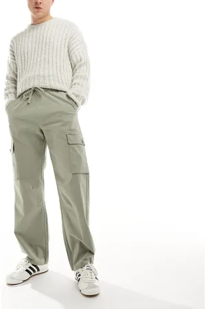 Bershka Pantaloni cargo a fondo ampio kaki in tessuto ripstop