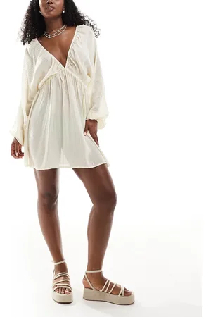 ASOS Vestito da spiaggia corto a maniche lunghe trasparente color crema a righe metallizzate con scollo profondo