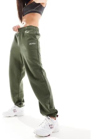New Balance Heritage - Pantaloni della tuta verdi in pile spazzolato con logo lineare