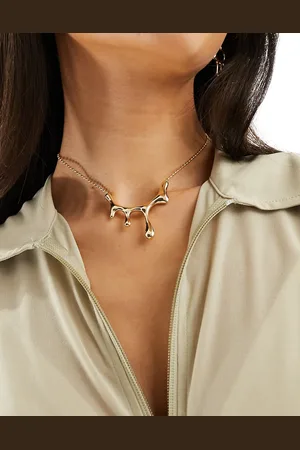 petit moments Banksey - Collana dorata con dettaglio effetto fuso