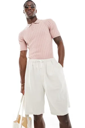 ASOS Polo attillata in maglia leggera a coste
