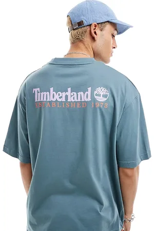 Timberland T-shirt oversize blu con logo grande sulla schiena - In esclusiva per ASOS