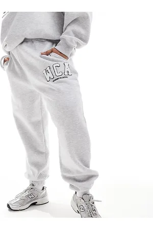 ASOS Curve - Joggers mélange con logo stile college