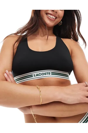 Lacoste Heritage - Brassière nera con logo e dorso a vogatore