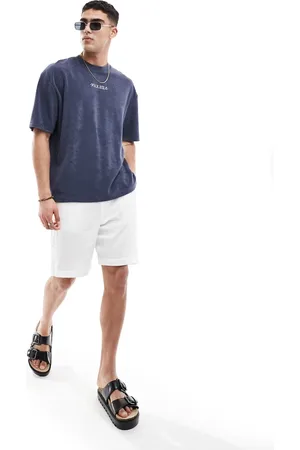 ASOS T-shirt oversize in spugna blu navy con scritta ricamata sul petto