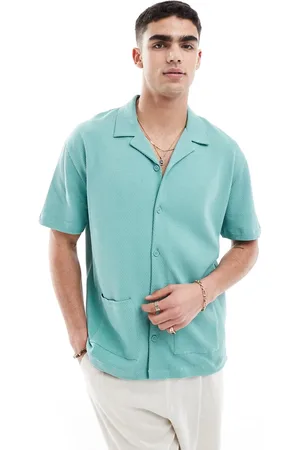 ASOS Polo comoda con rever