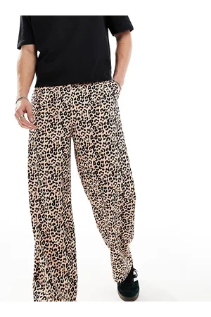 Reclaimed Pantaloni ampi unisex con stampa leopardata