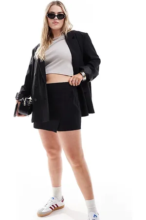 ASOS ASOS DESIGN Curve - Gonna pantalone a portafoglio in bengalina nera dal taglio asimmetrico
