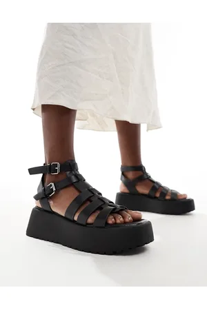 Stradivarius Sandali flatform con fascette neri