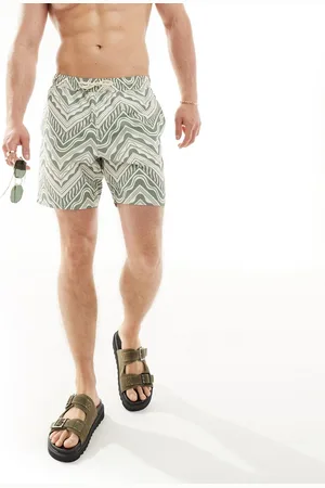 ASOS Pantaloncini da bagno corti verdi con stampa geometrica