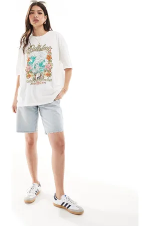 Billabong T-shirt bianca con scritta "Return to Paradise"