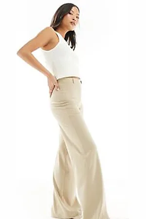 Bershka Petite - Pantaloni dad color sabbia a fondo ampio