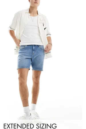 ASOS Pantaloncini di jeans taglio medio skinny lavaggio medio