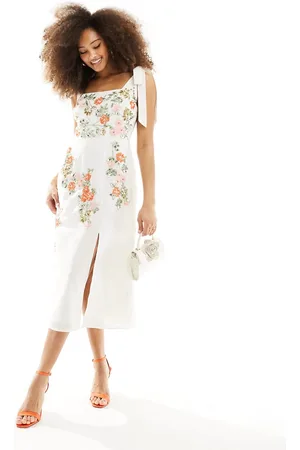 Maya Vestito midi color crema decorato con spalline annodate
