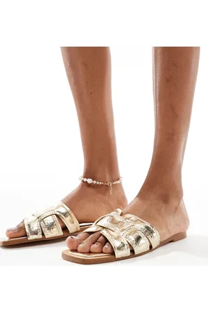 Stradivarius Sandali bassi dorati