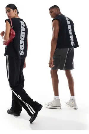 ASOS Canotta taglio corto squadrata oversize unisex nera con grafiche "Raiders"