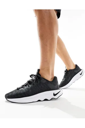 Nike Motiva - Sneakers nere e bianche